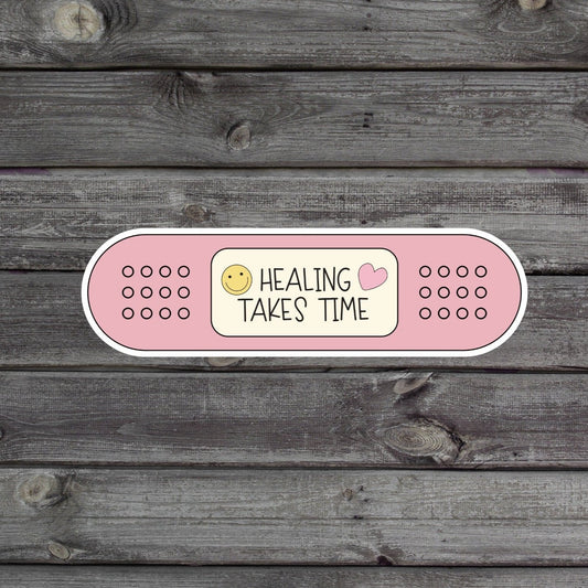 Healing Takes Time Sticker that looks like a bandage