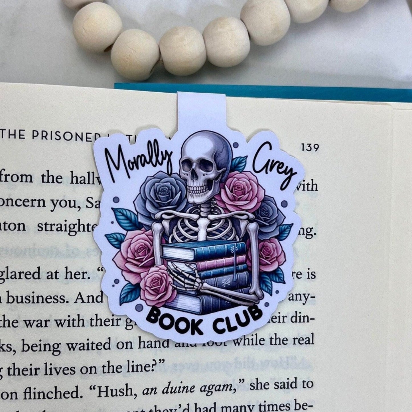 Morally Grey Skeleton holding a stack of books Bookmark